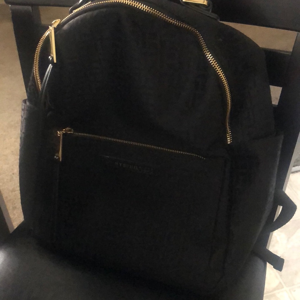 Tommy Hilfiger bag pack good condition